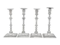 An Assembled Set of Four George III Silver Candlesticks