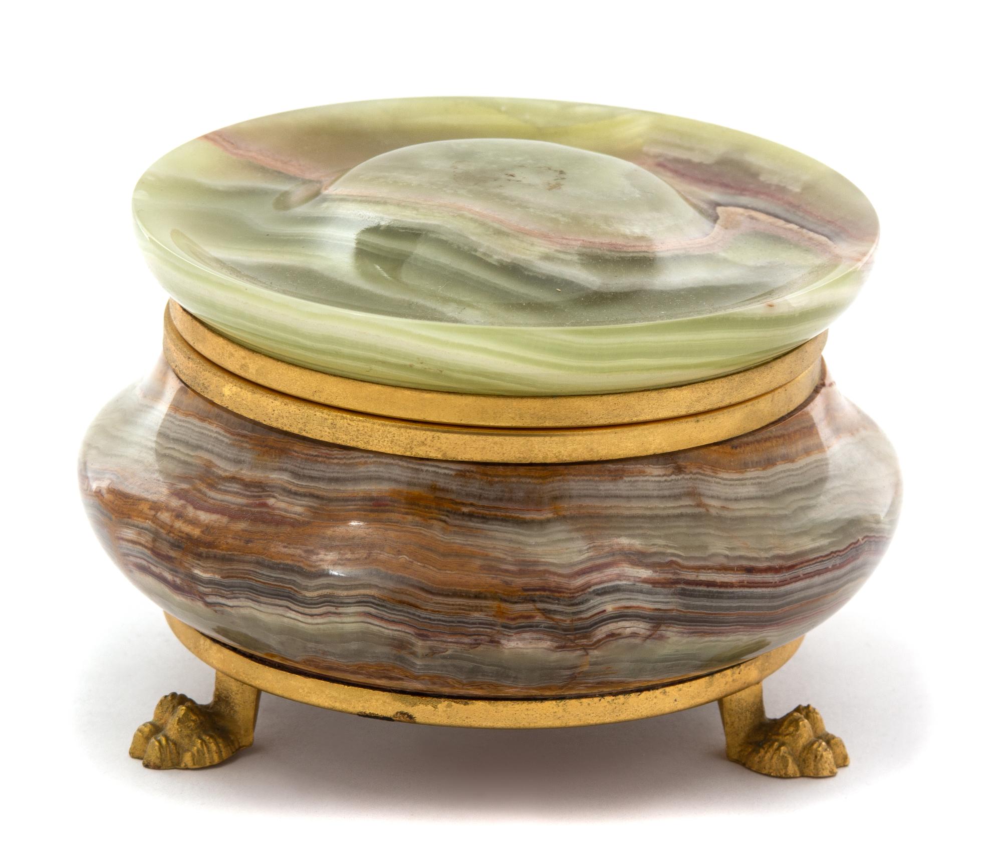 A French Gilt Bronze Mounted Onyx Hinged-Top Circular Box Height 3 1/8 x diameter 5 1/2 inches. — 19TH CENTURY
