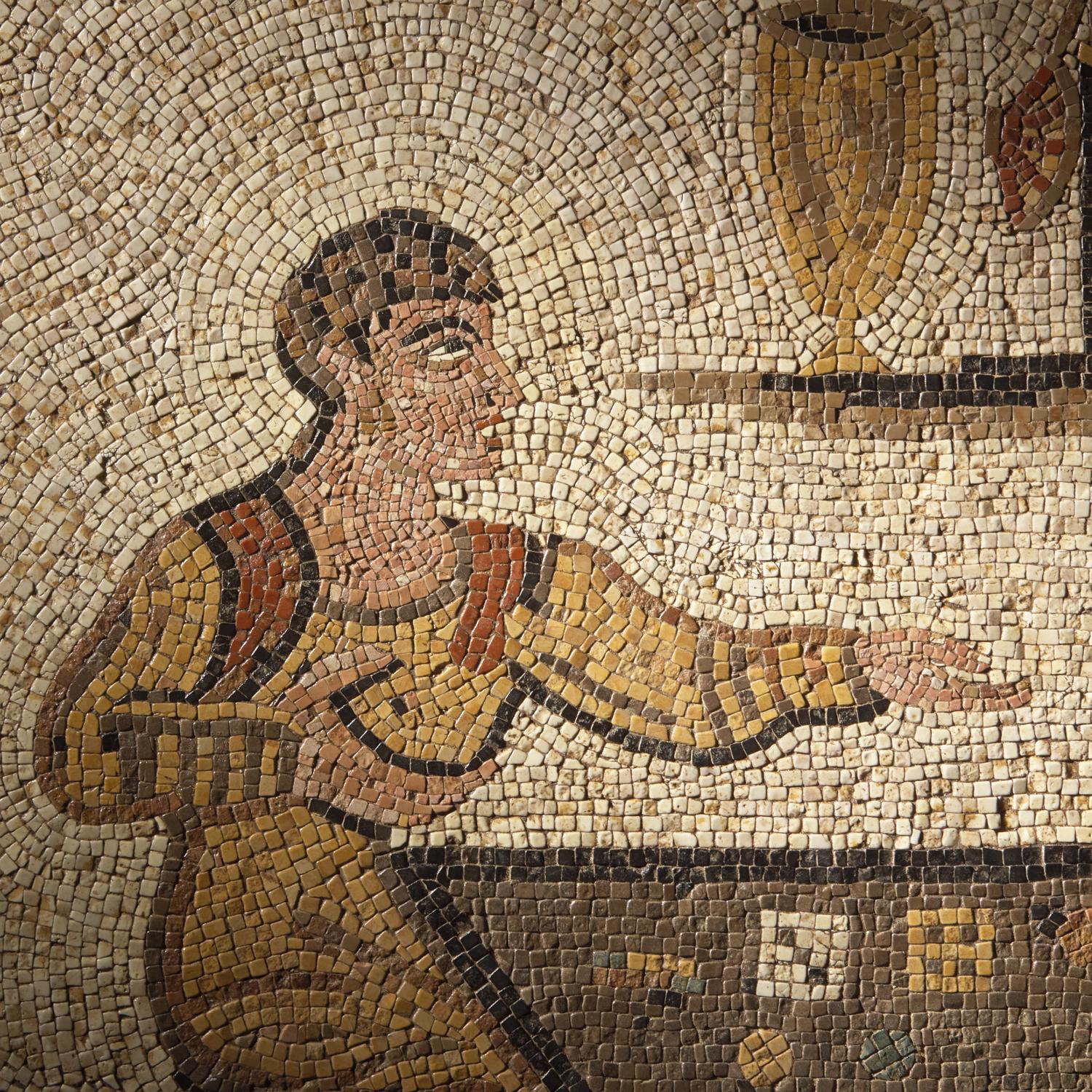 A Roman Style Stone Mosaic Panel with Men Playing a Dice Game