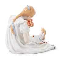 A Meissen Porcelain Figure of a Seated Girl with Flowers by Konrad Hentschel