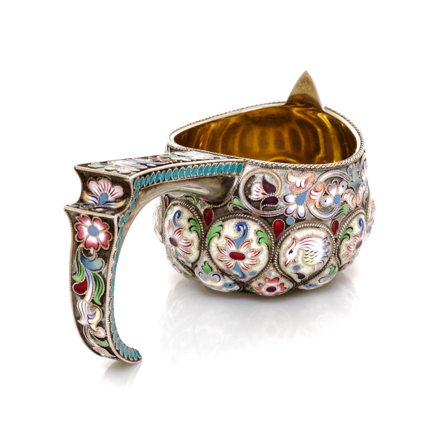 A Russian Enameled Silver Kovsh, Likely suprious mark of Faberge, Moscow, late 19th/early 20th century, having a lobed body decorated w