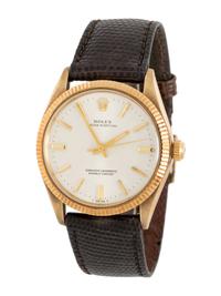 ROLEX, REF. 1005 14K YELLOW GOLD 'OYSTER PERPETUAL' WATCH WITH ROLEX BUCKLE