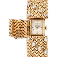 BOUCHE, YELLOW GOLD AND DIAMOND SURPRISE WATCH