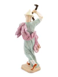 A Hochst Porcelain Figure of a Chinese Trumpeter