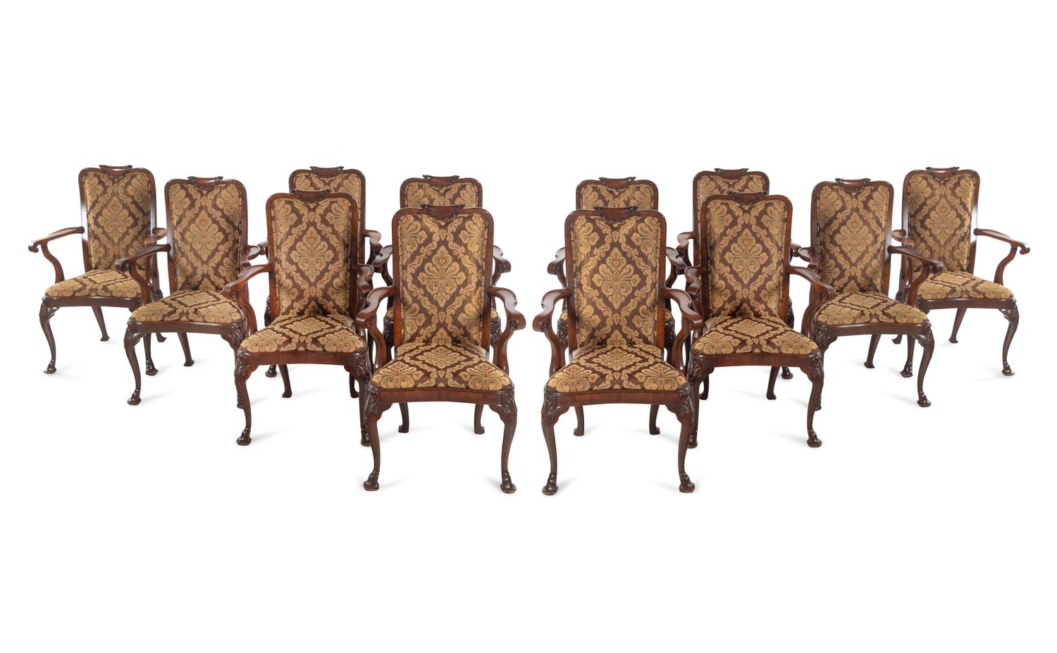 A Set of Twelve Queen Anne Style Mahogany Armchairs