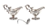 A Pair of American Silver Sauce Boats, Obadiah Fisher, New York, NY, each having a beaded rim and a scrolled handle, the body with an e