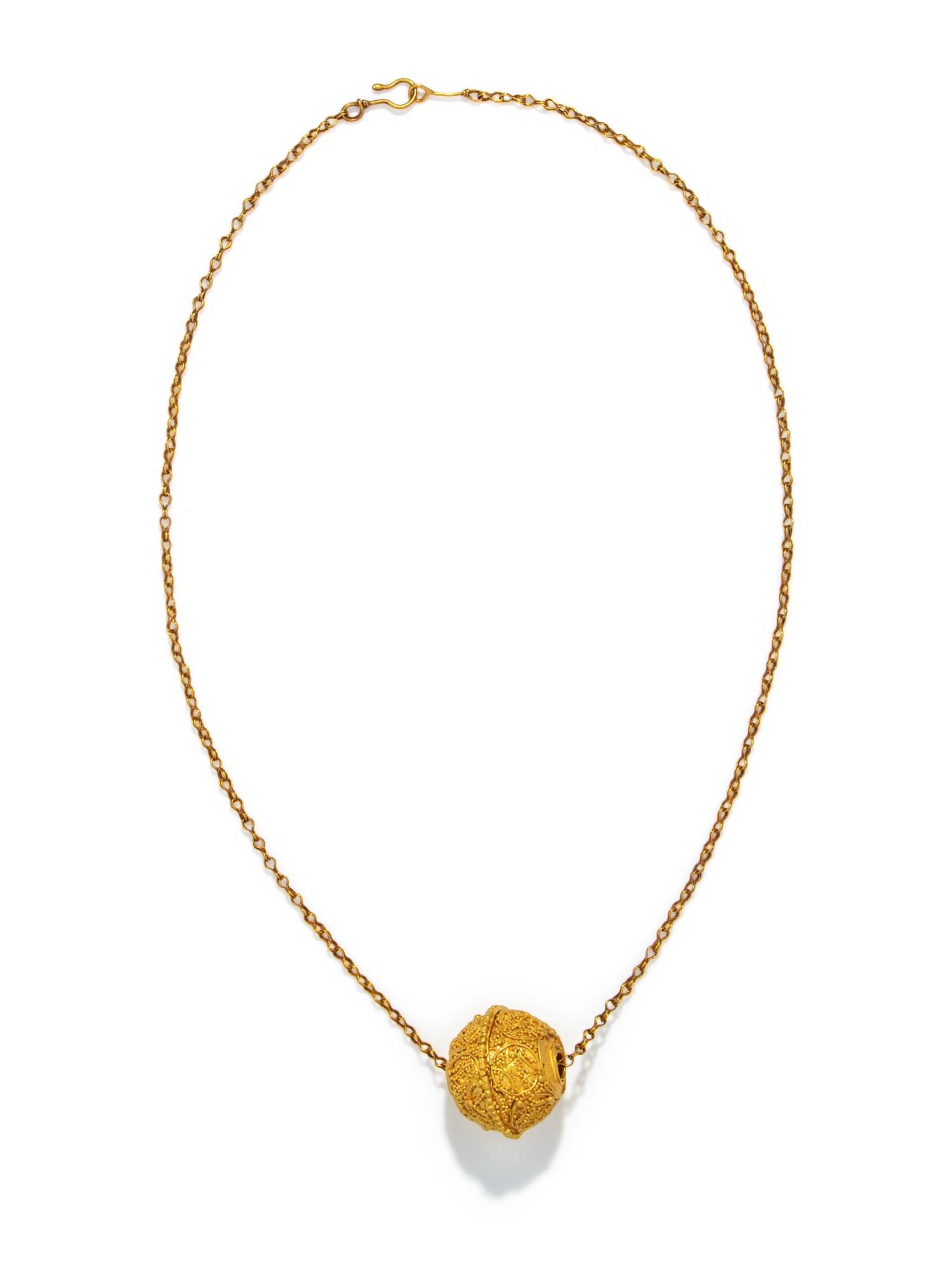 A Greek Gold Necklace with a Filigree Bead