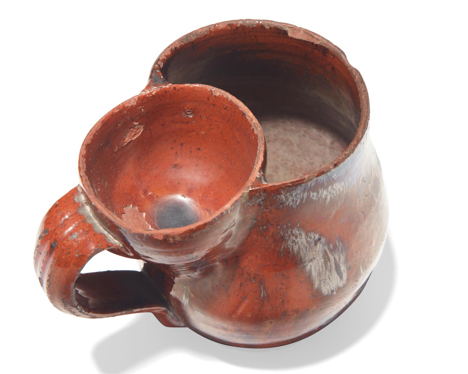 A Glazed Redware Shaving Mug, Pennsylvania, late 19th century