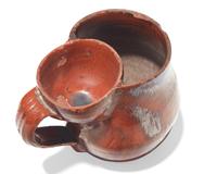 A Glazed Redware Shaving Mug, Pennsylvania, late 19th century