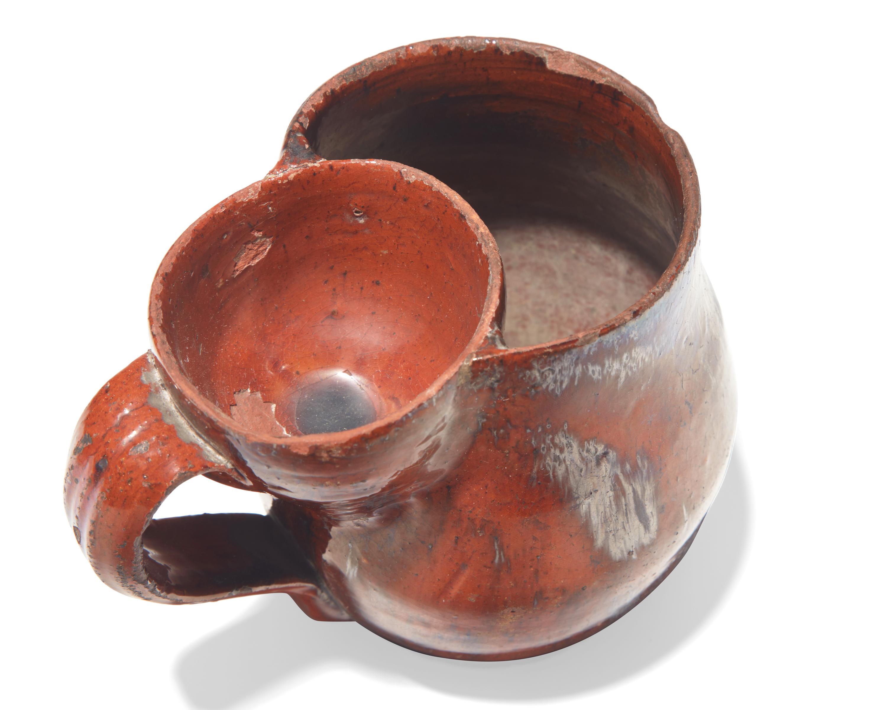 A Glazed Redware Shaving Mug, Pennsylvania, late 19th century