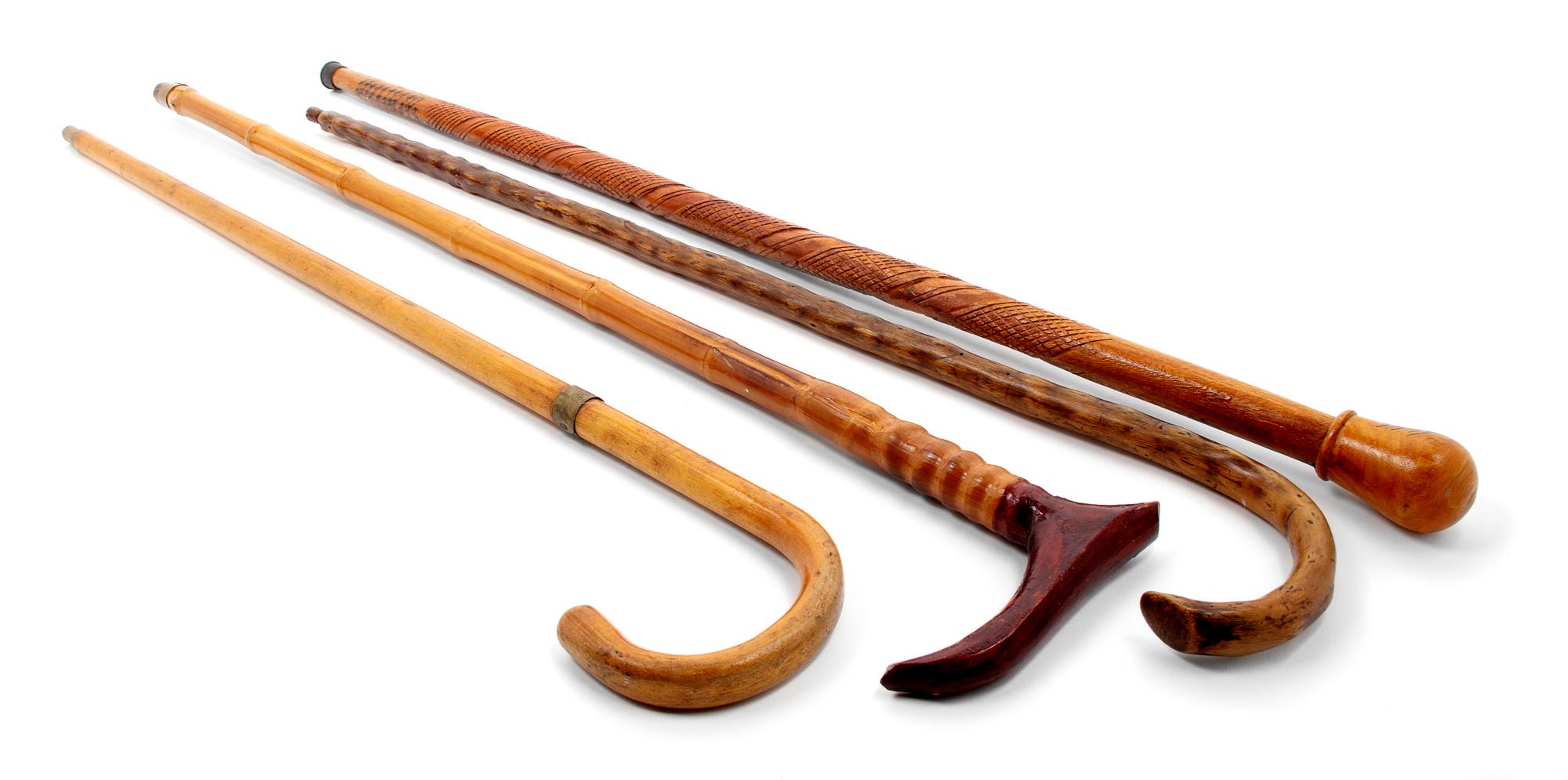 A Group of Eight Carved Wood Canes