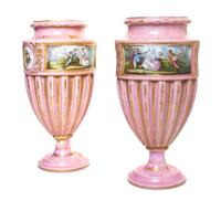 A Pair of Sevres Style Porcelain Urns, Height 14 inches.