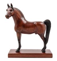 A Carved and Painted Wood Figure of a Thoroughbred Horse Height 13 inches. — PETER GIBA, 20TH CENTURY