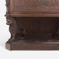 A Renaissance Revival Carved Walnut Chest on Stand Italian, 19th century