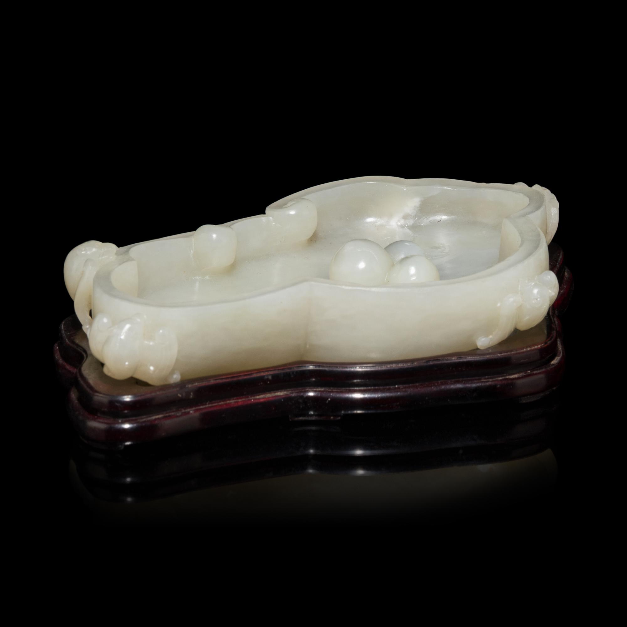 A Chinese White Jade 'Peach and Bat' Washer 白玉云蝠壽桃紋筆洗