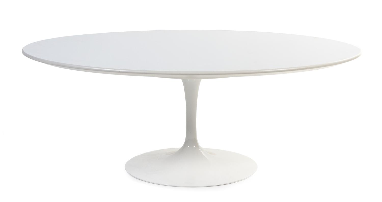An Eero Saarinen Tulip Low Table Height 16 x length 42 x width 27 1/2 inches.