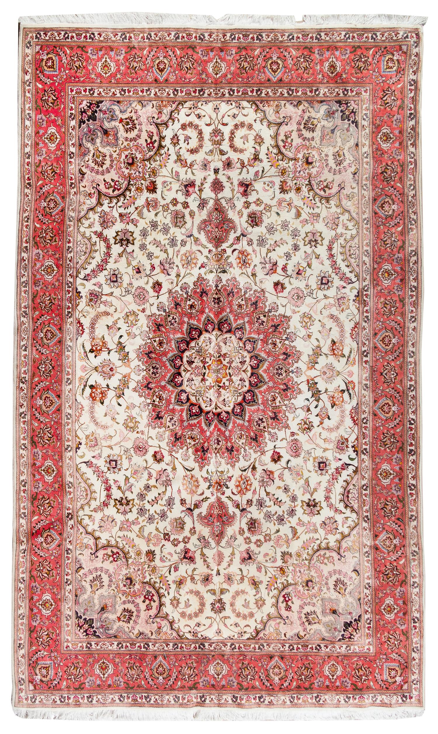 A Tabriz Wool and Silk Rug 9 feet 5 inches x 6 feet 5 inches. — 20TH CENTURY