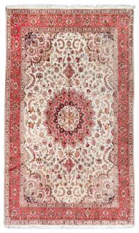 A Tabriz Wool and Silk Rug 9 feet 5 inches x 6 feet 5 inches. — 20TH CENTURY