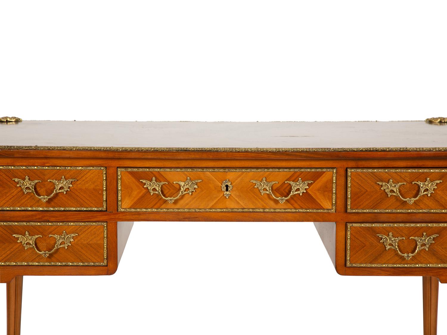 A Louis XVI Style Gilt-Bronze Mounted Mahogany Bureau Plat
