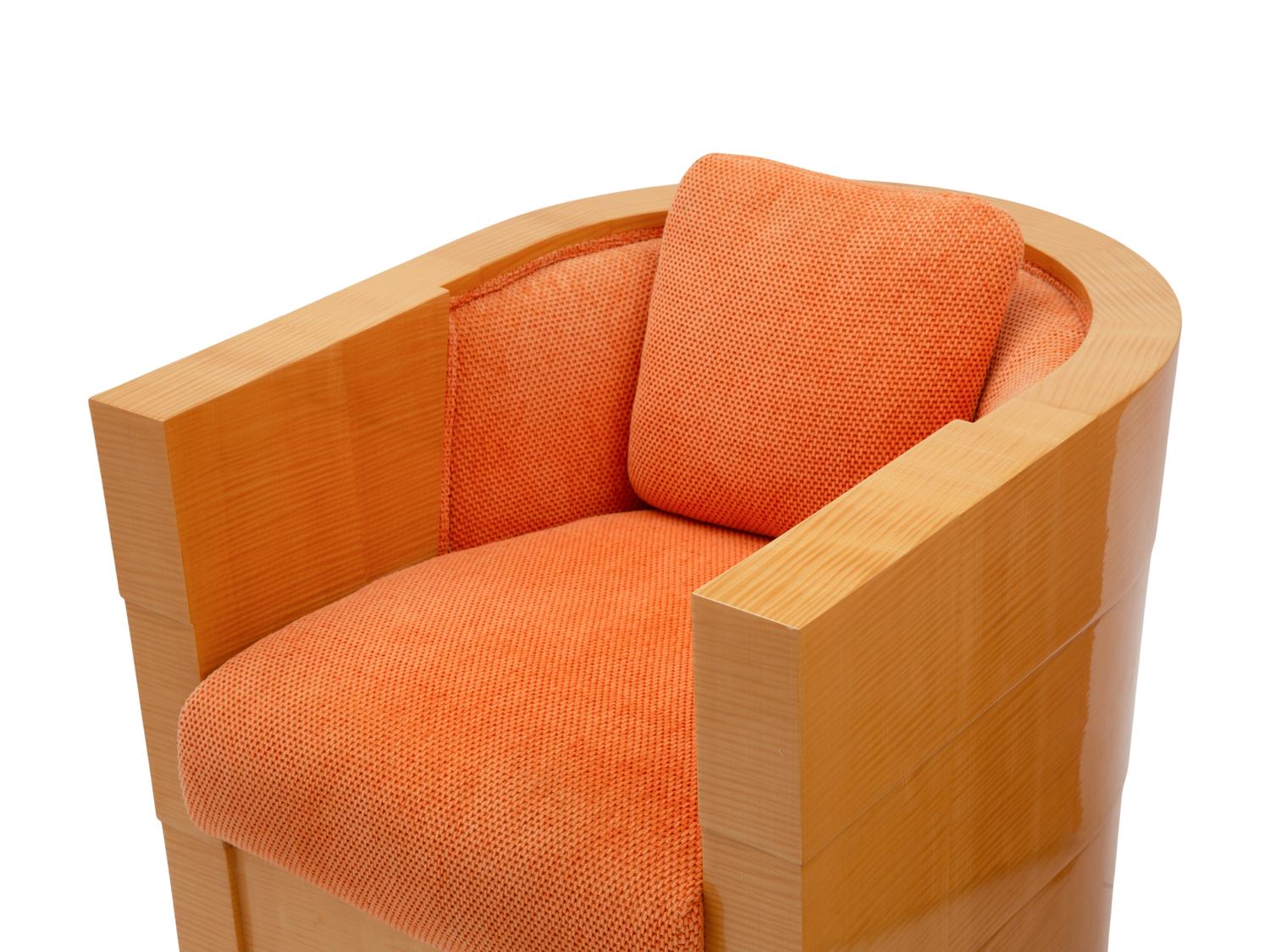 A Pair of Enrique Garcel Satinwood Club Chairs