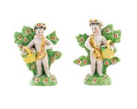 A Pair of Chelsea Derby Porcelain Figures of Putti — 19TH CENTURY
