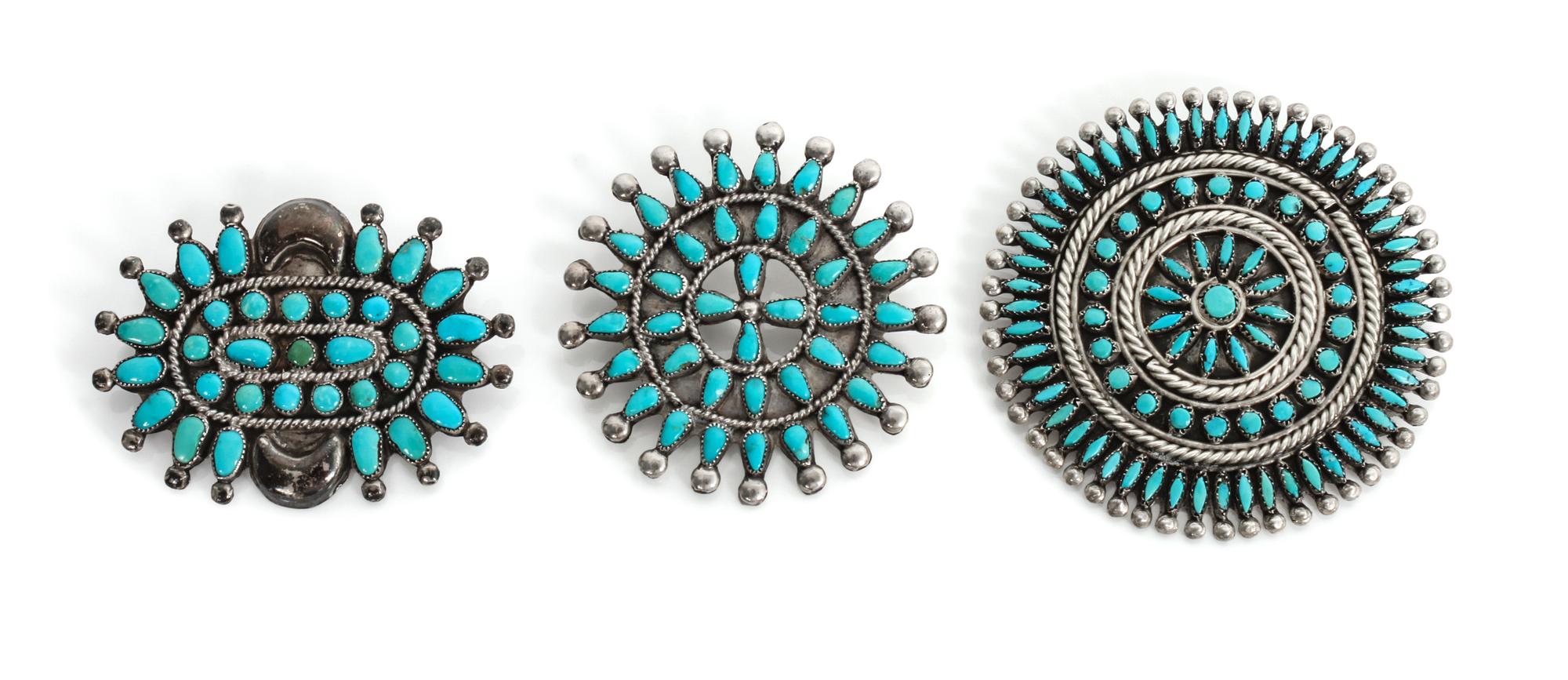 Three Zuni Petit Point Pins Diameter of largest 2 1/4 inches.