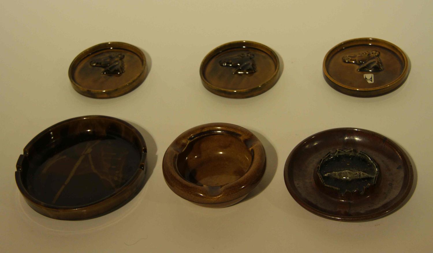 A Collection of Twenty-Three Haeger Pottery Ash Receivers Width of widest 7 7/8 inches.