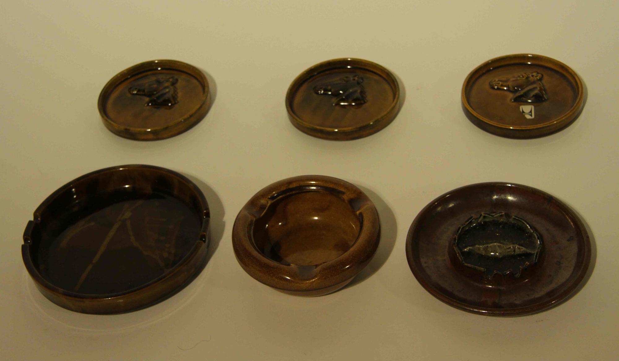 A Collection of Twenty-Three Haeger Pottery Ash Receivers Width of widest 7 7/8 inches.