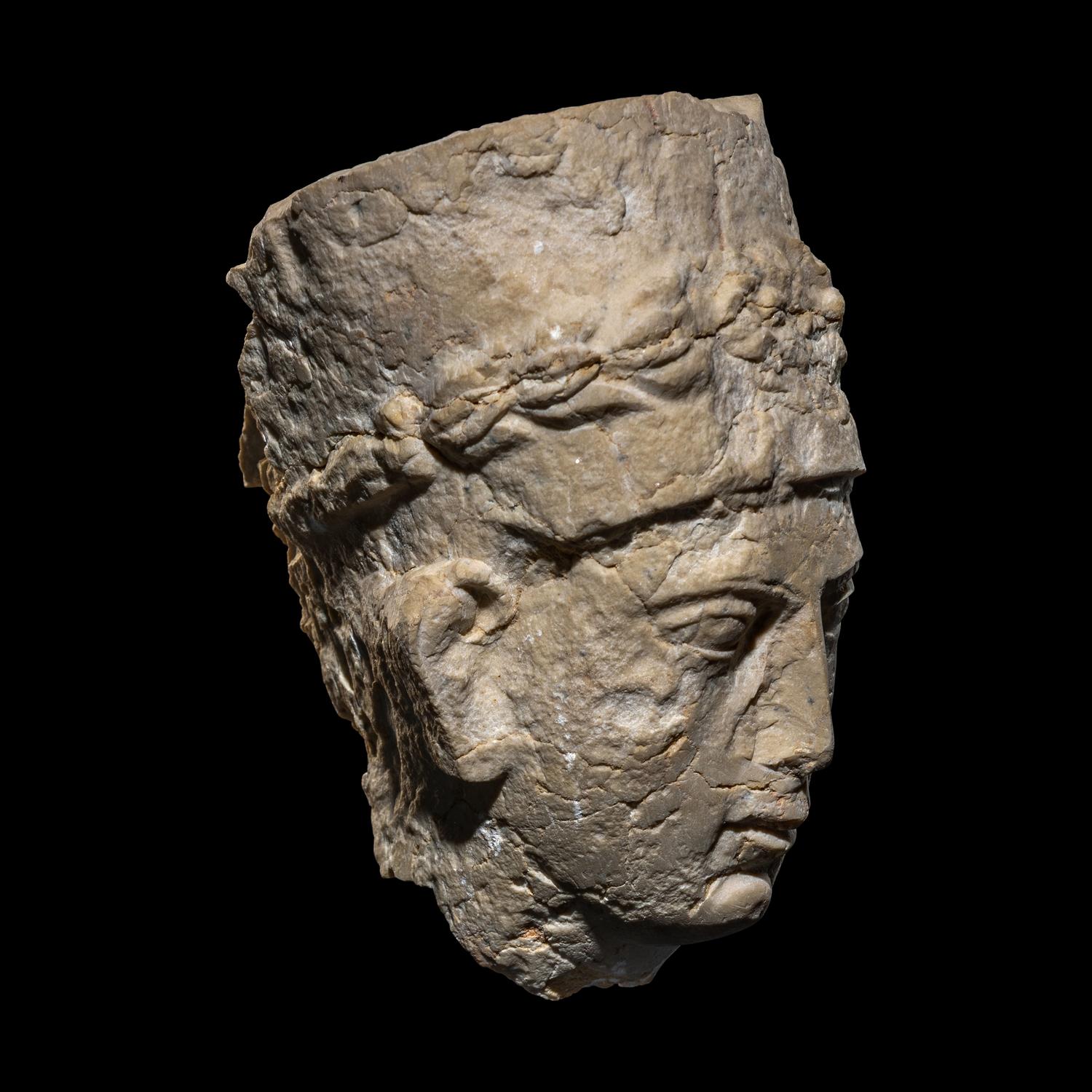 A Palmyrene Limestone Head of a Priest