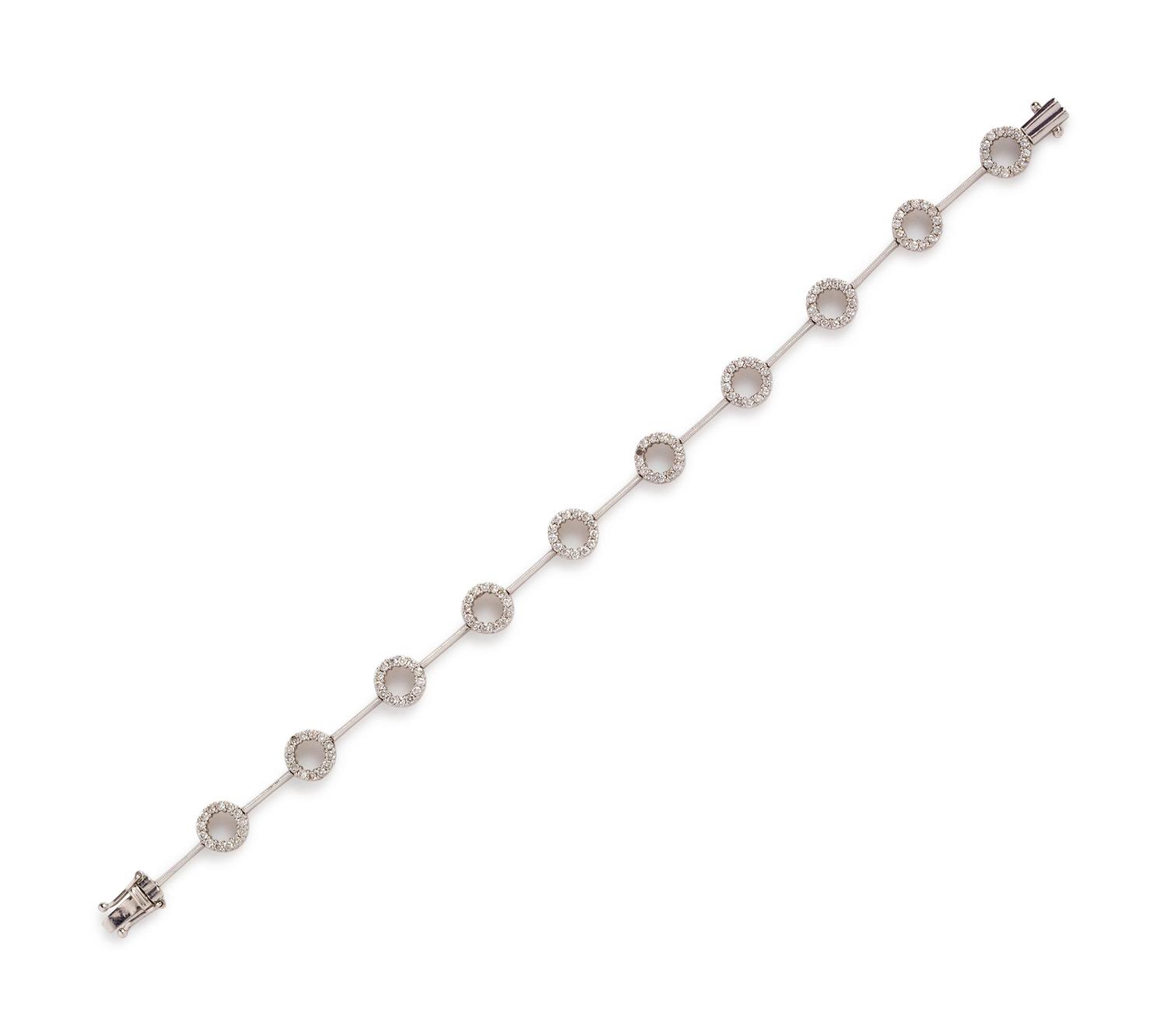 A 14 Karat White Gold and Diamond Bracelet,