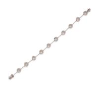 A 14 Karat White Gold and Diamond Bracelet,