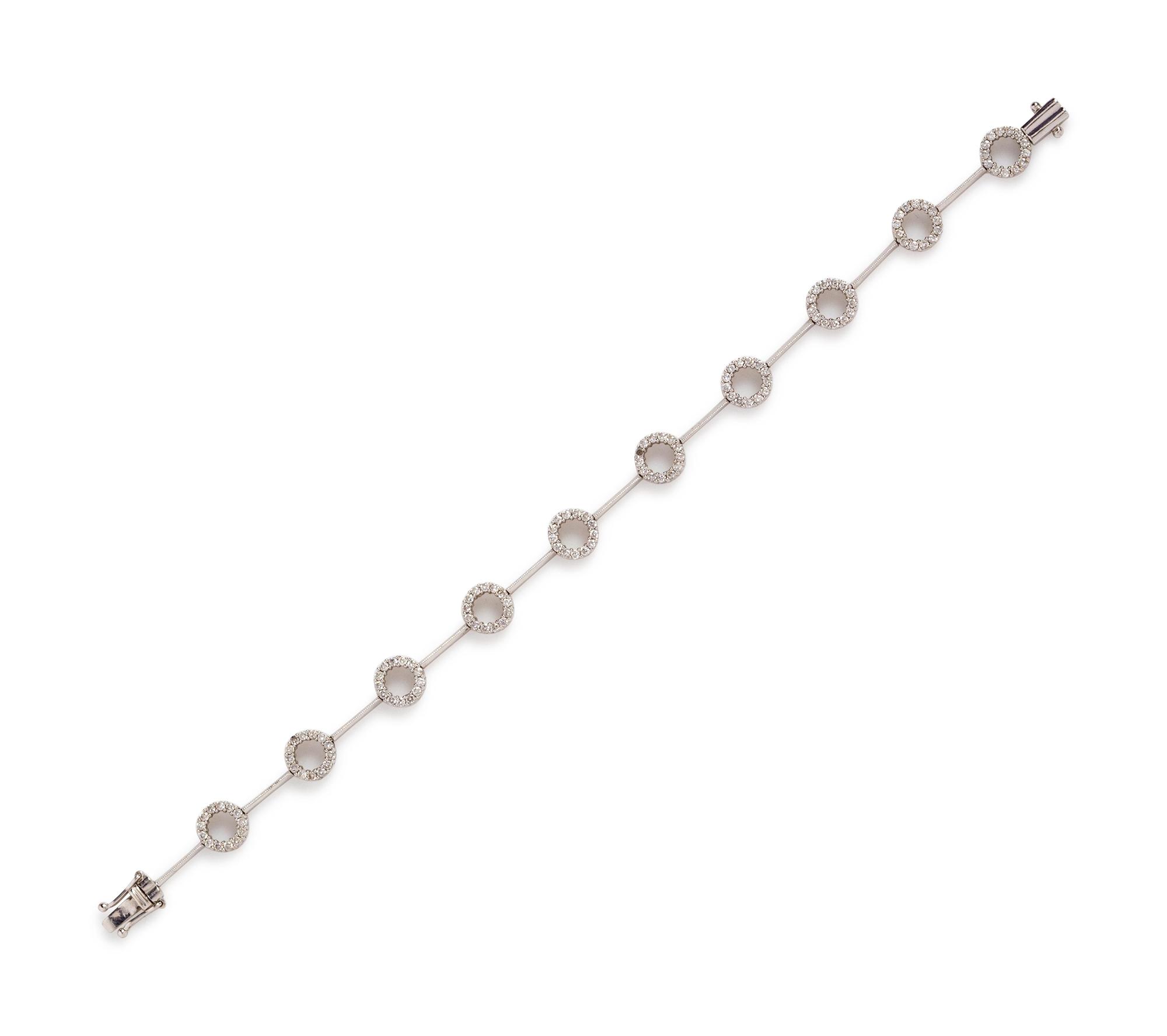 A 14 Karat White Gold and Diamond Bracelet,
