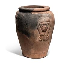 An Egyptian Pottery Jar with Head of Hathor