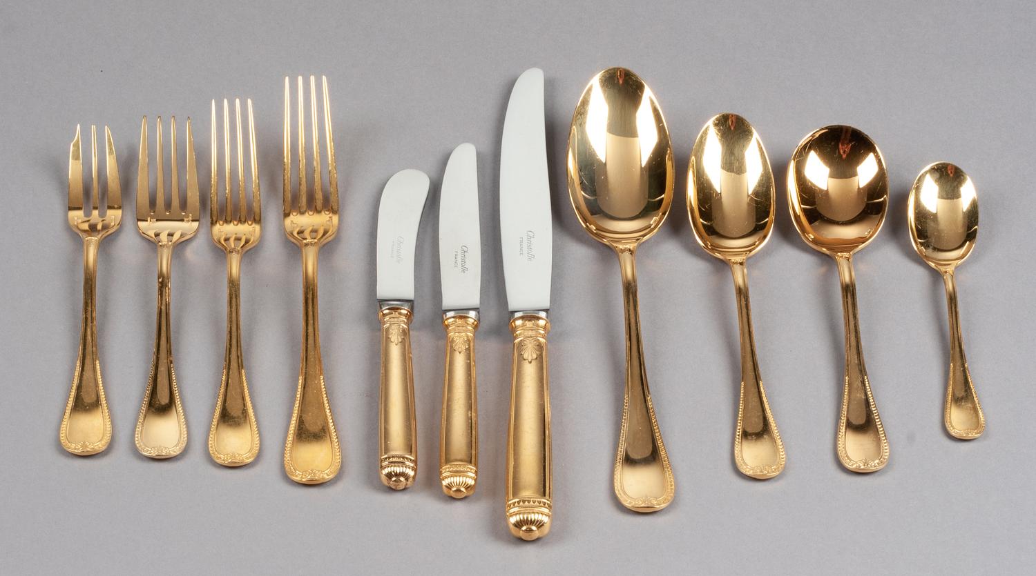 A French Gilt Silver-Plate Flatware Service, Christofle, Paris, 20th Century, Malmaison-Gold pattern, comprising: 84 dinner knives 24 l