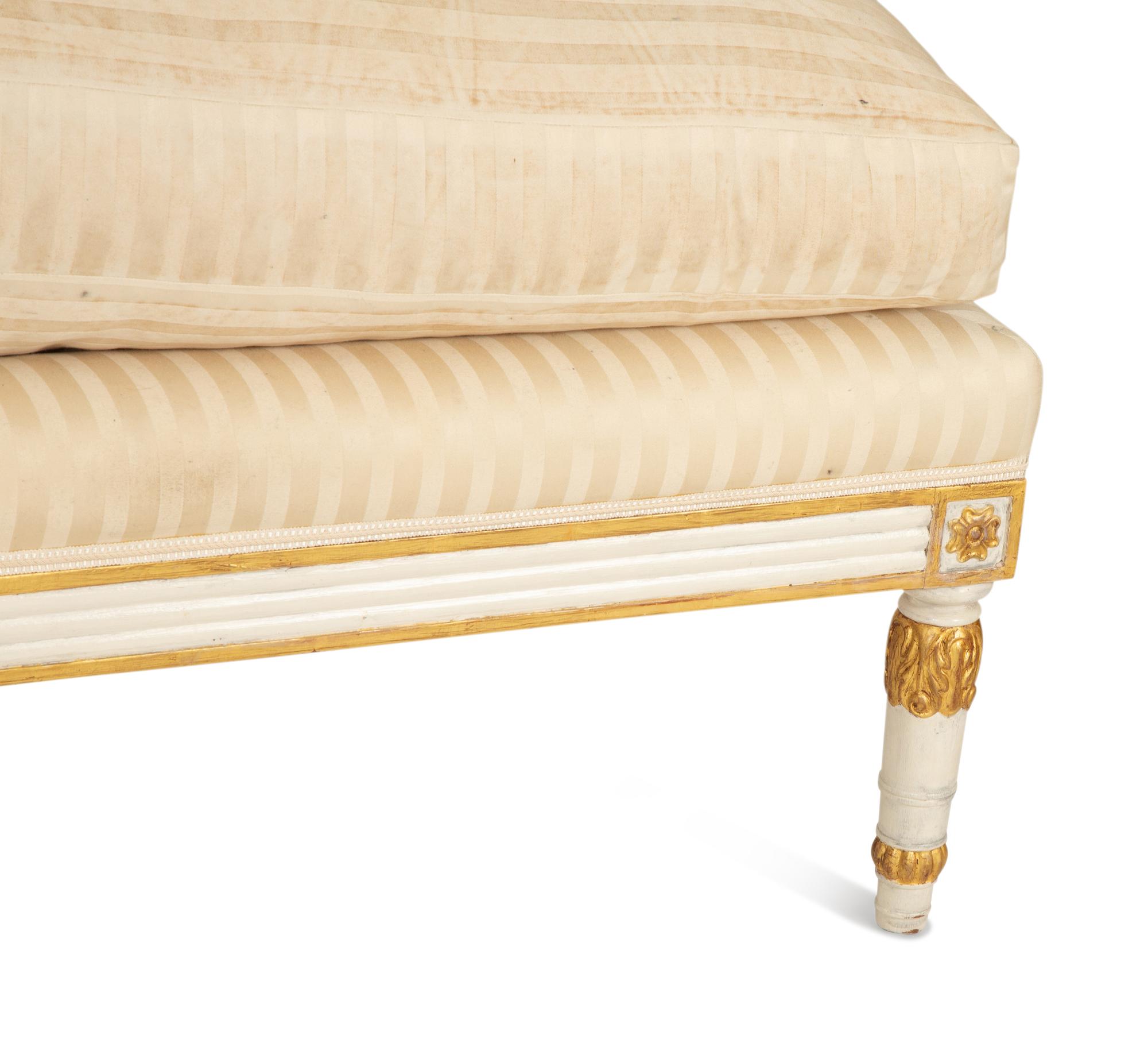 An Italian Painted and Parcel Gilt Chaise Lounge