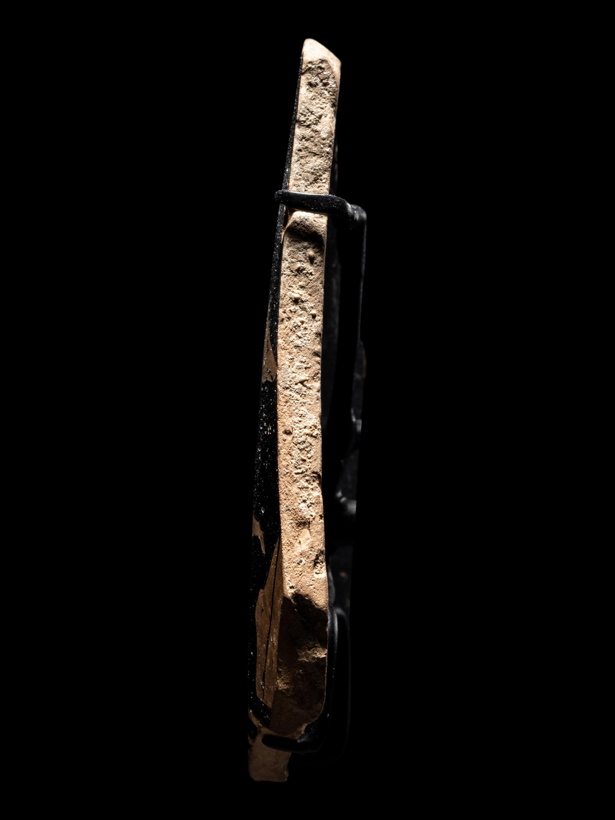 An Attic Red-Figured Skyphos Fragment with a Dog
