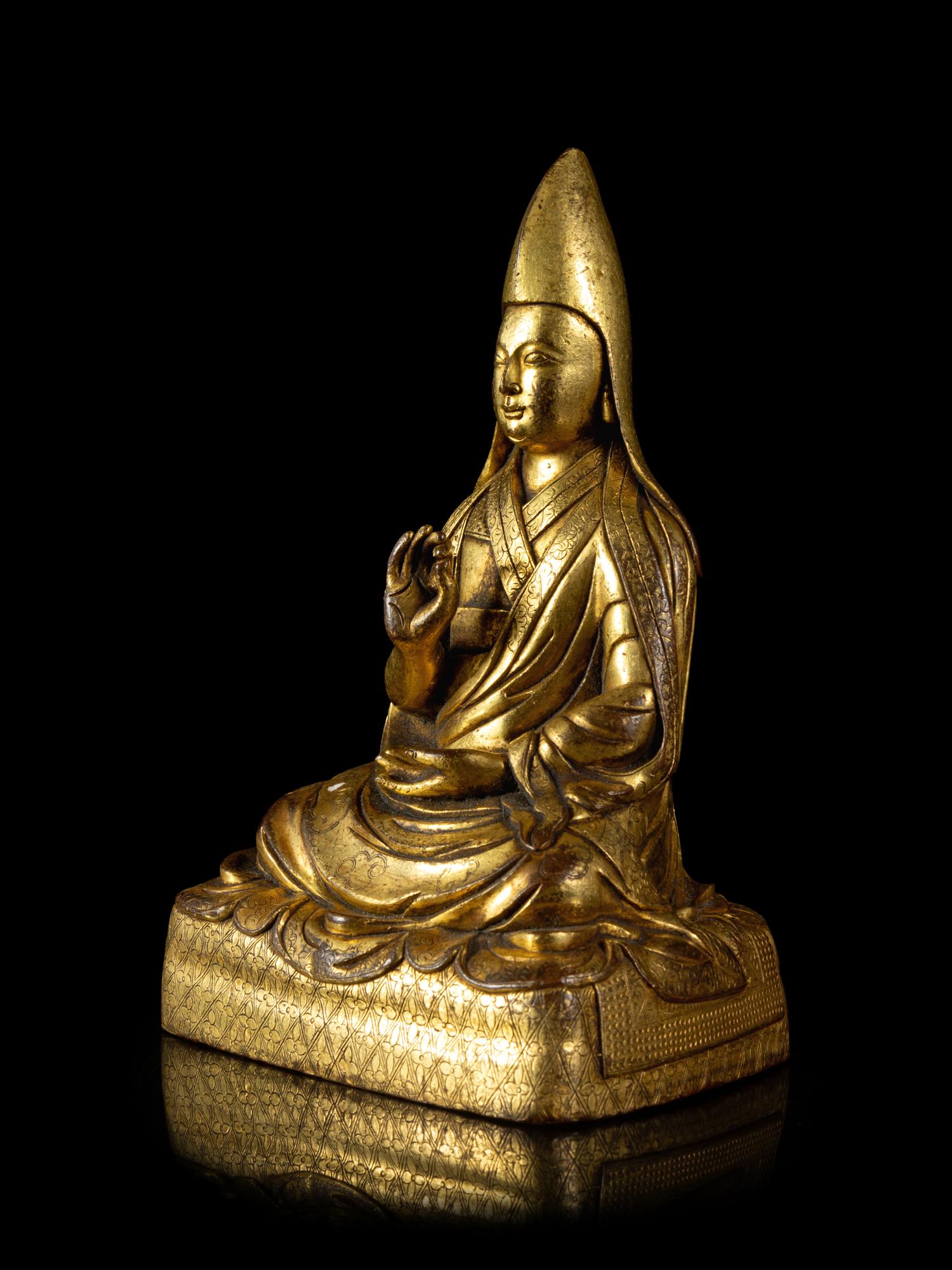 A Sino-Tibetan Gilt Bronze Figure of Gelukpa Lama