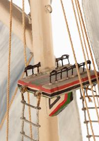 A Carved and Polychrome Painted Wooden Ship Model