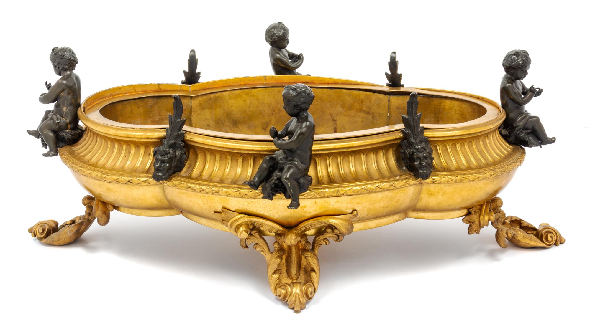 A French Gilt and Patinated Bronze Jardiniere Height 11 x width 30 inches. — LATE 19TH CENTURY