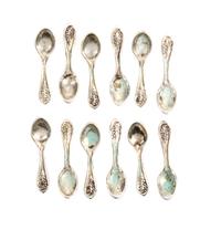 A Set of Twelve American Silver Teaspoons, Attributed to Obadiah Fisher, New York, NY, each having Old English handles with beaded deco
