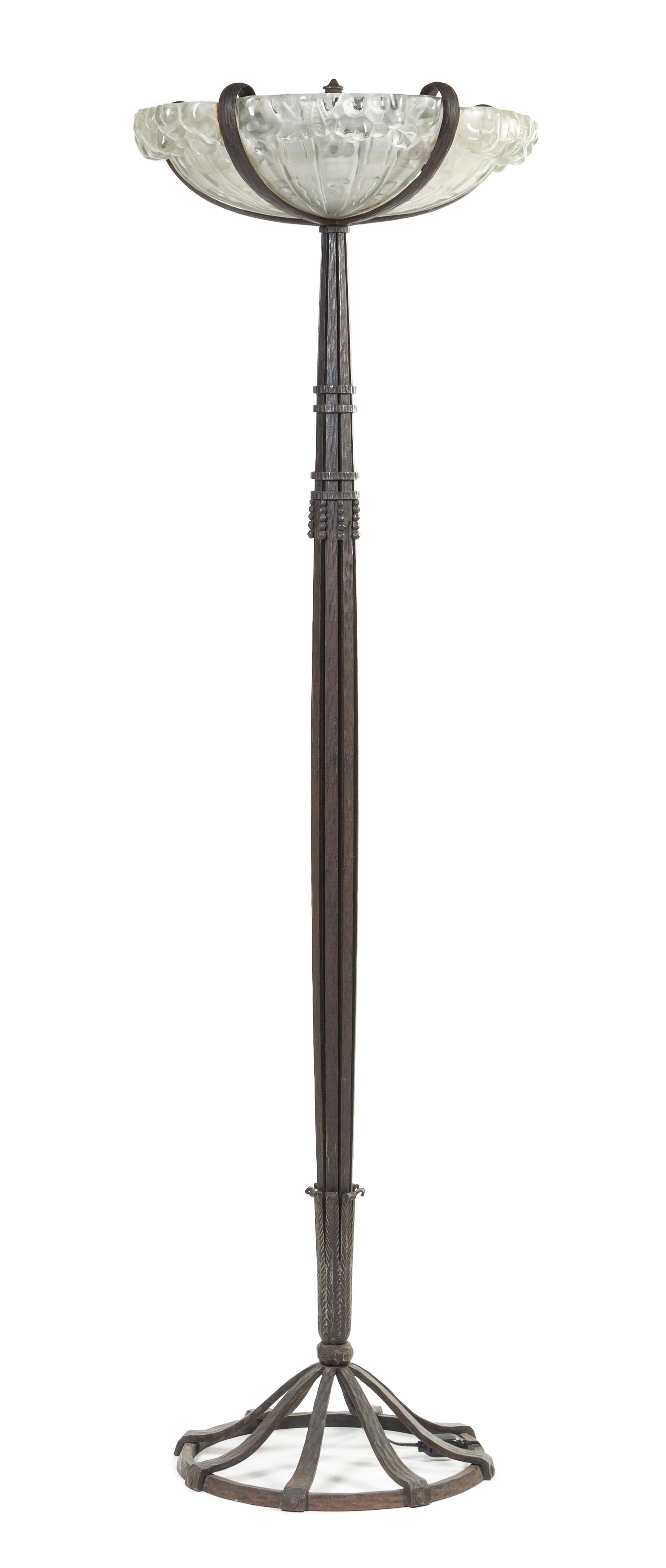 An Art Deco Wrought Iron and Glass Torchere, in the Manner of Ryamond Stubes, Glass Attributed to Muller Frères Height 72 inches.