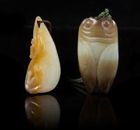 Two Carved Jade Pendants Length of first 2 inches.