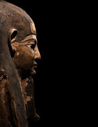 An Egyptian Painted Wood Mummy Mask