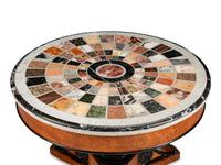 A Charles X Part Ebonized Cherrywood and Specimen Marble Center Table