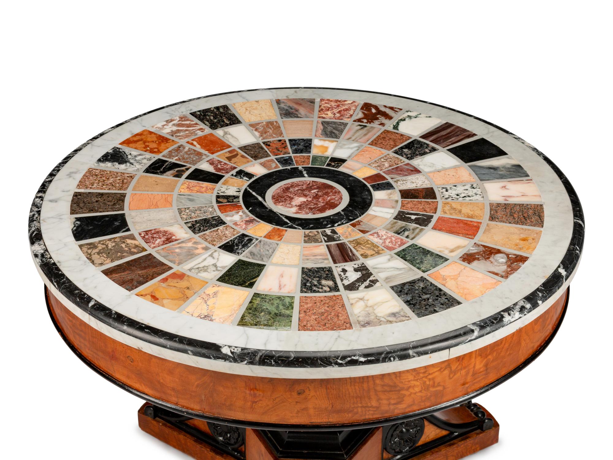 A Charles X Part Ebonized Cherrywood and Specimen Marble Center Table