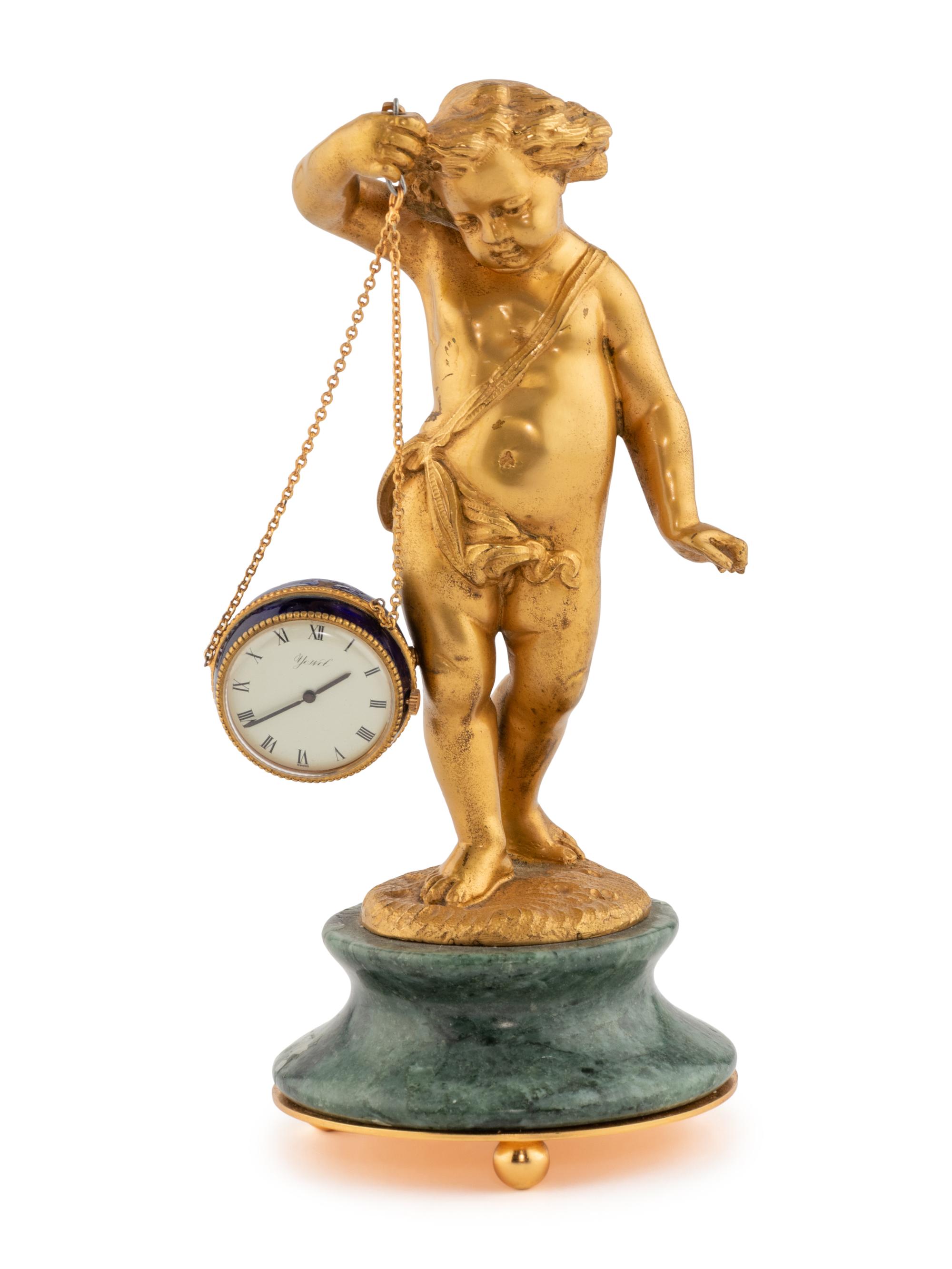 A Continental Gilt Bronze and Marble Figural Clock