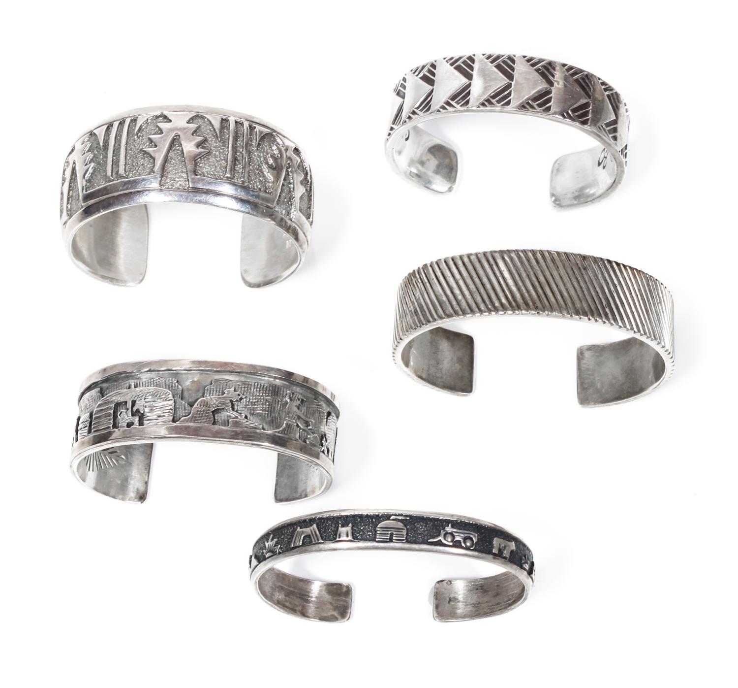 Five Southwestern Silver Bracelets Length of first 5 7/8 x opening 3/4 x width 3/8 inches