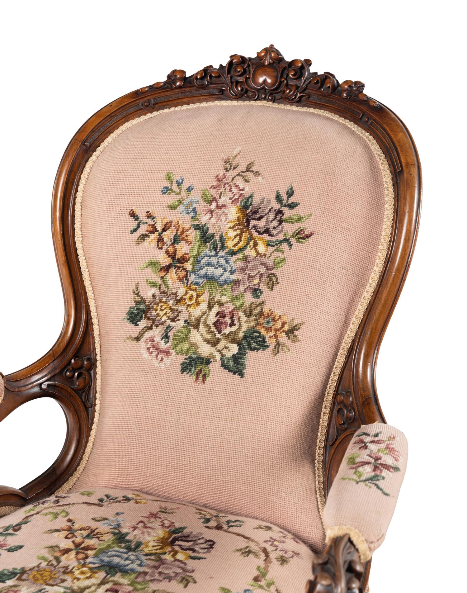 Two Rococo Revival Carved Walnut Chairs