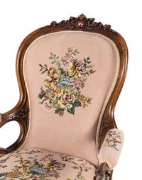 Two Rococo Revival Carved Walnut Chairs
