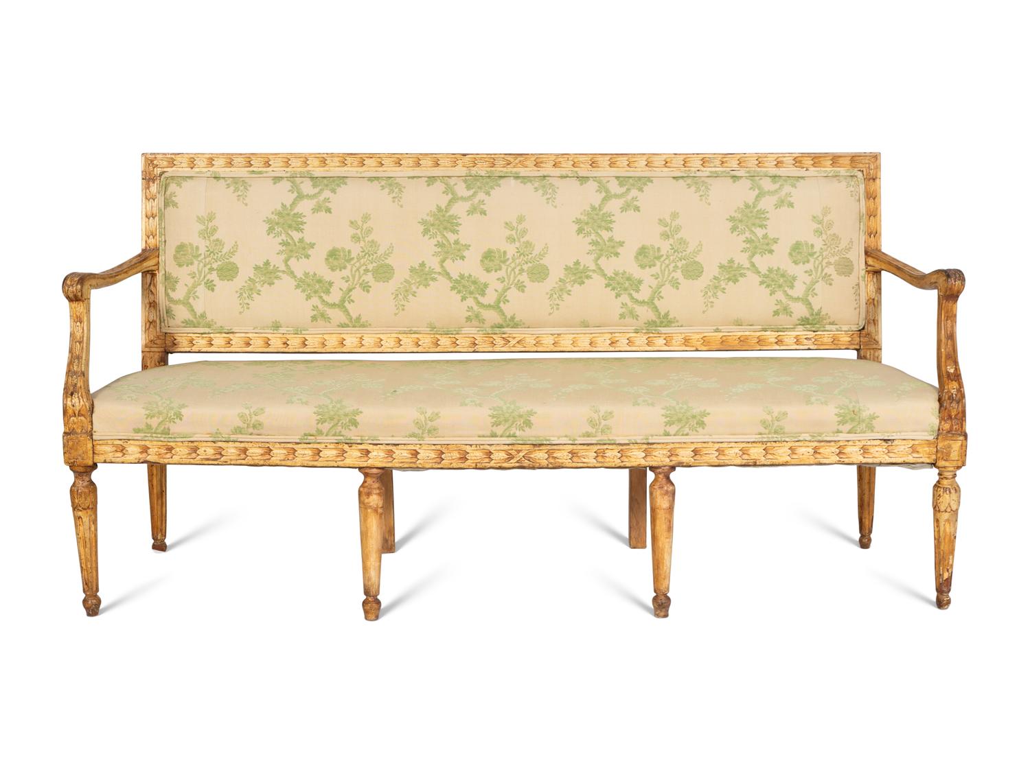 A Near Pair of Italian Neoclassical Cream-Painted Sofas
